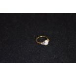 An 18ct Gold Opal and Diamond Ring