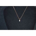 A 9ct Gold Opal Pendant on a 9ct Gold Chain