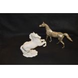 A Silver Plated Figurine of a Horse and Another