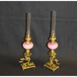 A Very Fine Pair of Brass Based Peg Lamps