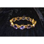 A Very Nice Gold and Amethyst Bracelet