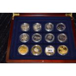 A Set of 12 Assorted Commemorative Coins