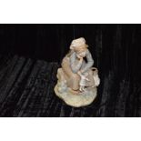 A Lladro Figurine 'Girl with Doll'