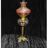 A Brass Based Oil Lamp, Clear Glass Bowl and Shade