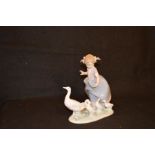 A Lladro Figurine 'Girl with Geese'