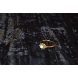 A 9ct Gold Opal and Emerald Ring