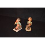 Two Hummel Figurines 'Boy with Case' and 'Boy with Umbrella'
