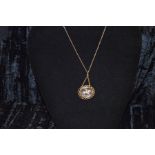 A Victorian Gold Pendant and Gold Chain