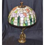A Brass Based Table Lamp and Large Tiffany Shade