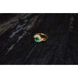An 18ct Gold Emerald and Diamond Ring