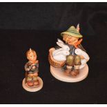 Two Hummel Figurines 'Boy with Rabbits' and 'The Hiker'