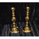 A Pair of Brass Candlesticks