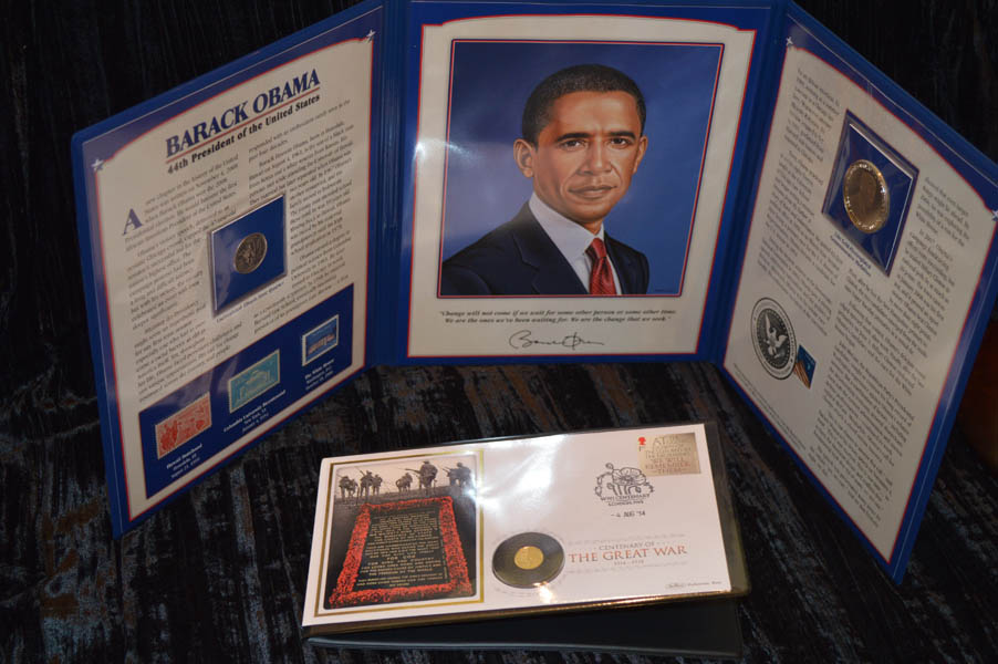 A Barack Obama Cased Coin and Stamp Set and a WWI Coin Set