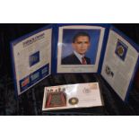A Barack Obama Cased Coin and Stamp Set and a WWI Coin Set