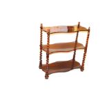 A Rosewood Shaped Front, Three Shelf Whatnot