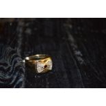 A Gents 9ct Gold Garnet and Diamond Ring