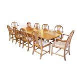 A Very Good Extending Mahogany Dining Room Table, Three Leaves and Matching 10 Chair Set including 2