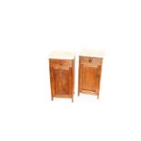 A Pair of Marble Topped Bedside Cabinets