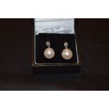 An 18ct Pearl and Diamond Set Earrings