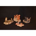 A Lot of Four Border Fine Art Figurines