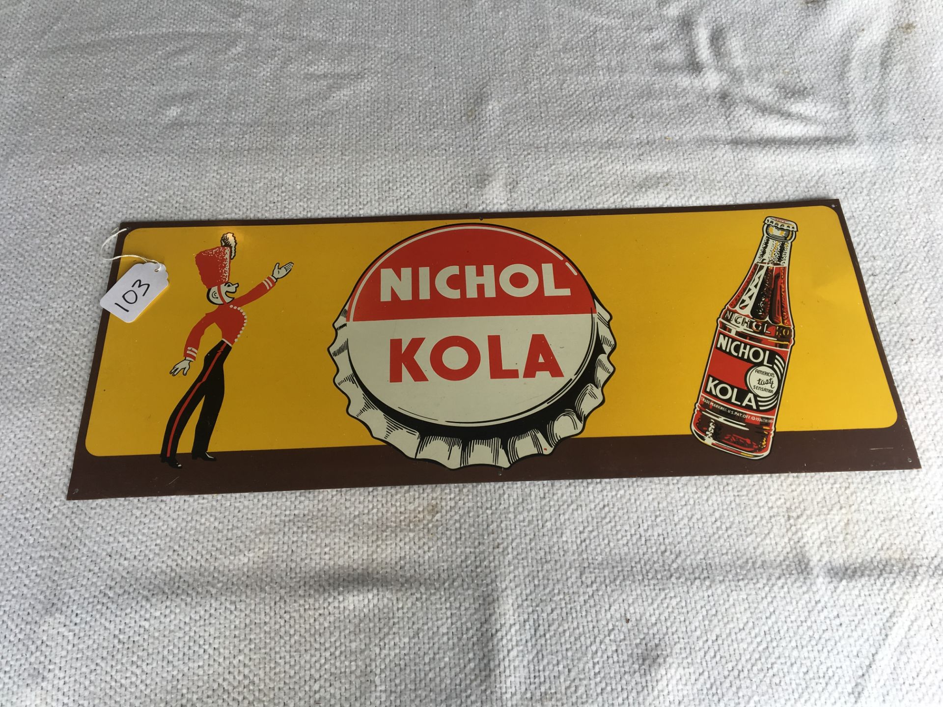 Nichol Kola sign, 11 ¾” x 29 ½”