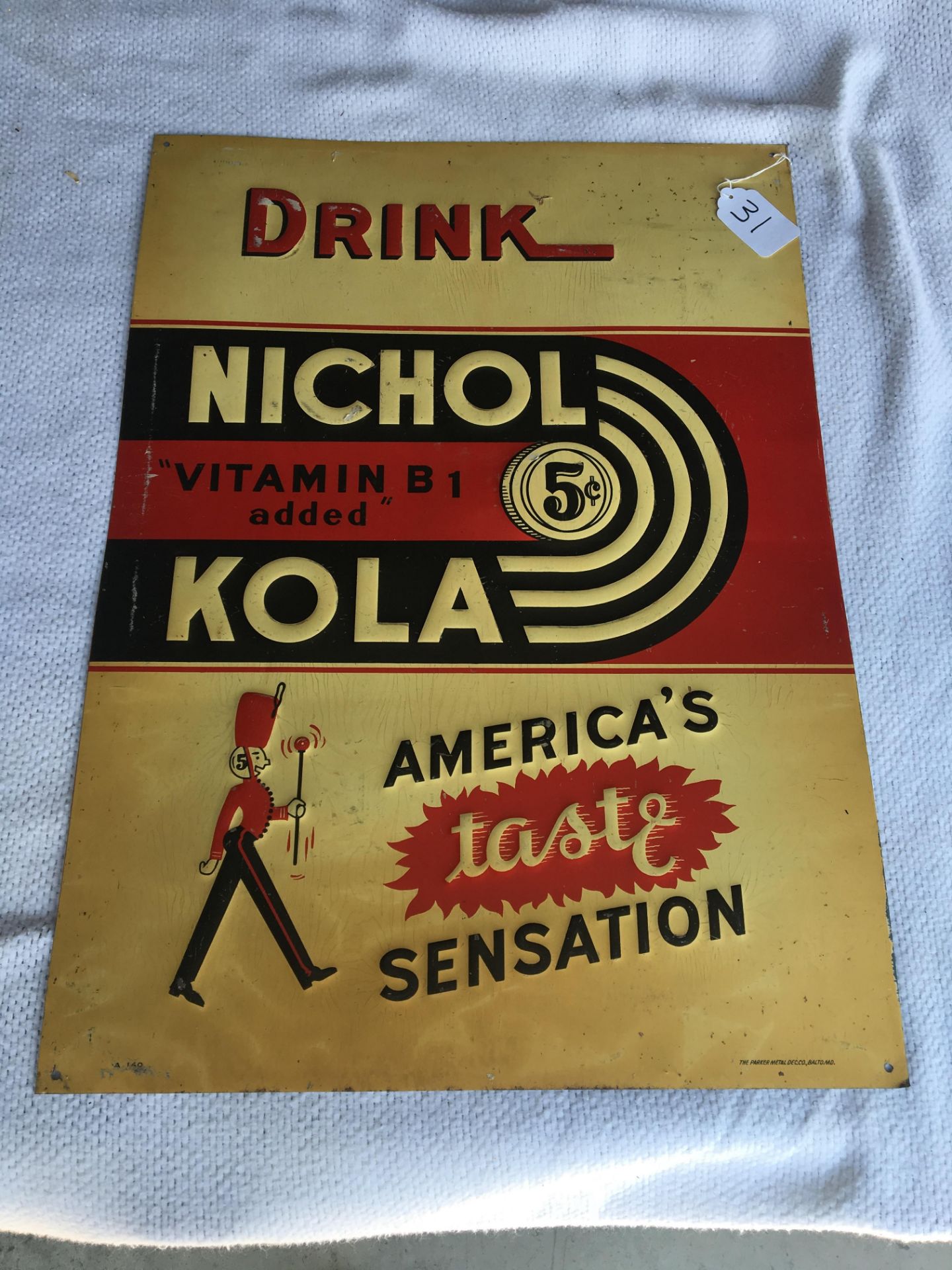 Nichol Kola, 20” x 28”, Metal Sign, The Parker Metal Dec. Company, (A-140)