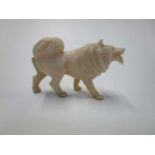 Snijwerk van een Chineese Foo hond 3,5x5,5cm