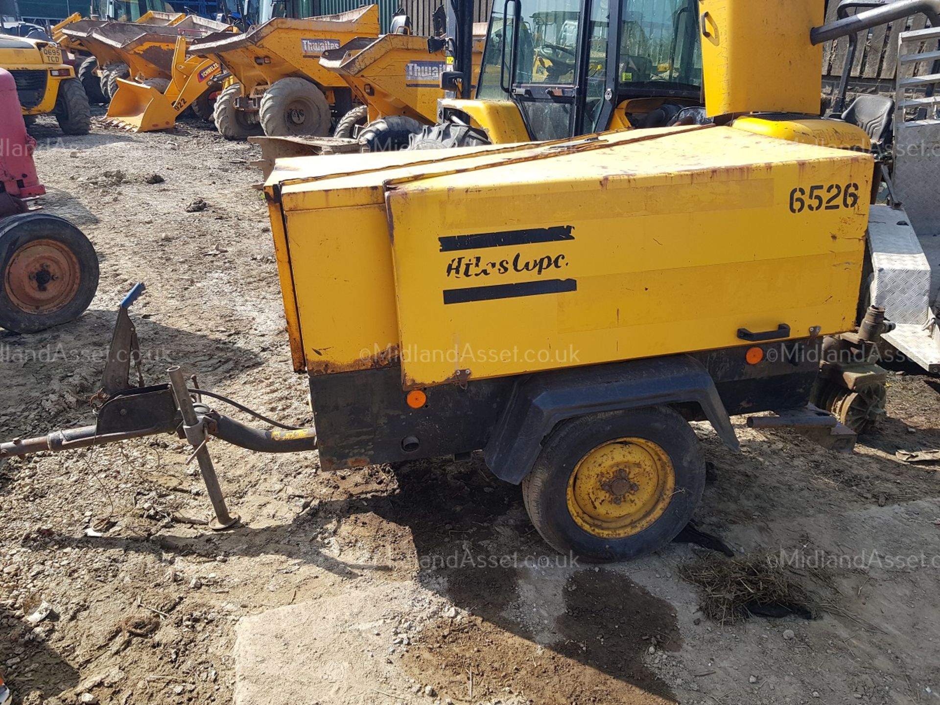 SINGLE AXLE TOWABLE ATLAS COPCO COMPRESSOR, STARTS, RUNS AND PRODUCES AIR. TWIN AIR OUTLETS - Image 2 of 7