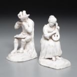 Pair Continental white glazed hard paste figurines