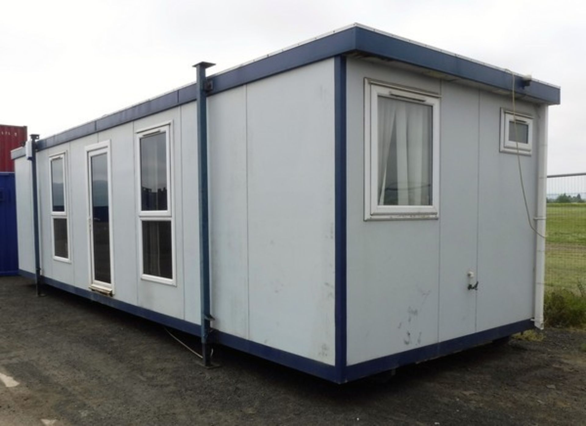 2007 PORTABLE BUILDING. 10m x 3.1m with toilet & kitchen. Double glazed, alarm fitted, insulated.