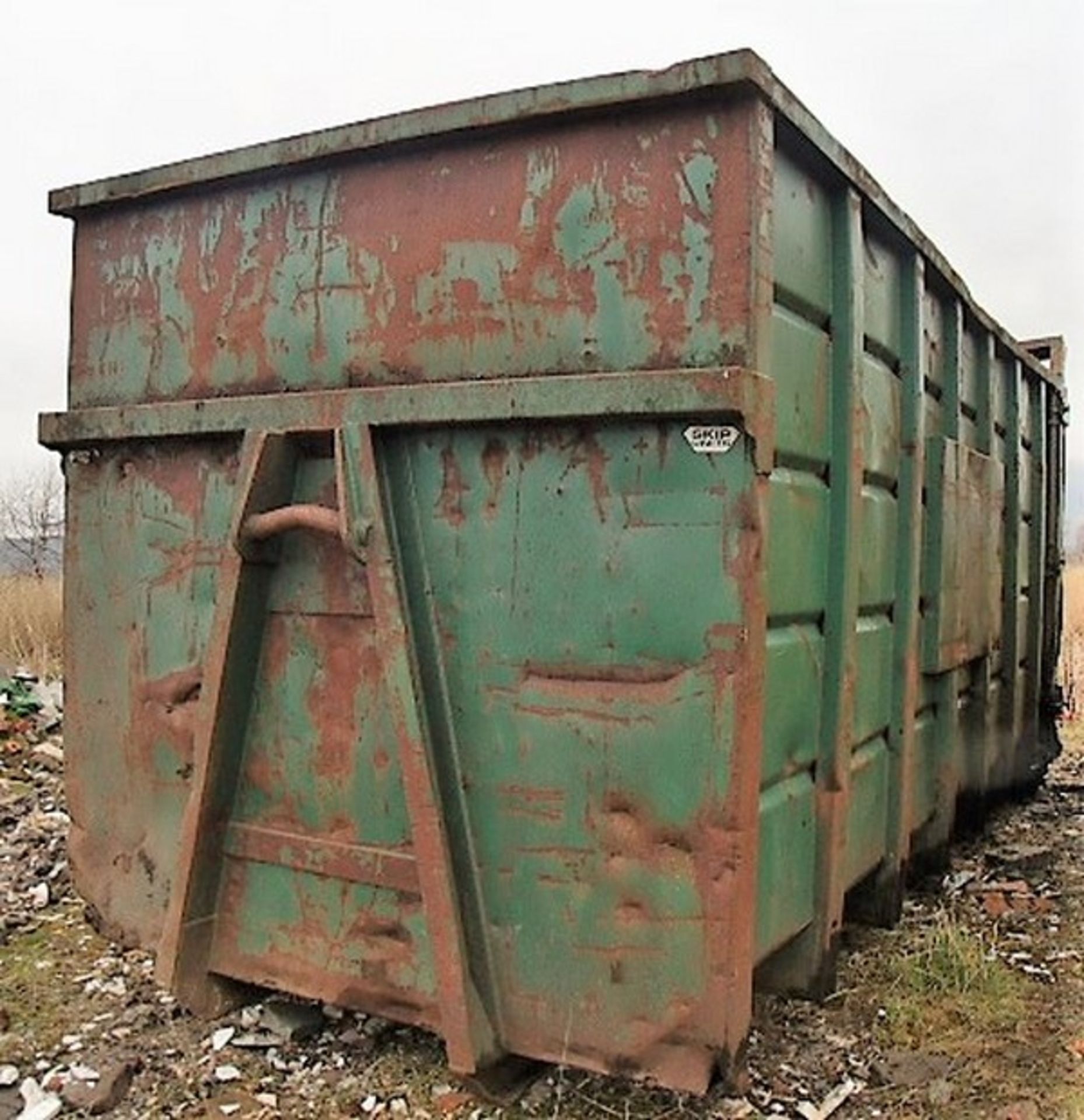 OPEN TOP SKIP C/W ACCESS LADDER. SOLD FROM ERROL AUCTION SITE. VIEWING AND UPLIFT FROM LOWER POLMAIS