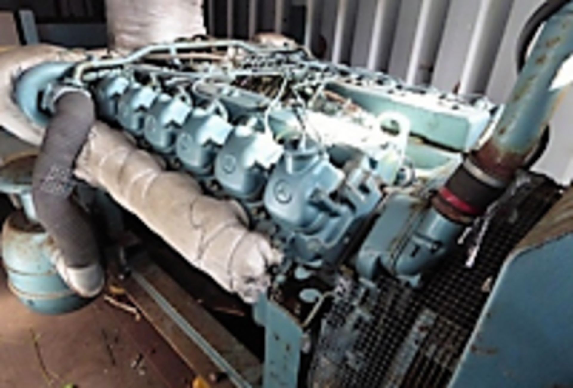 MERCEDES V12 diesel 300KVA generator housed in 20ft container with self contained fuel tank. Working