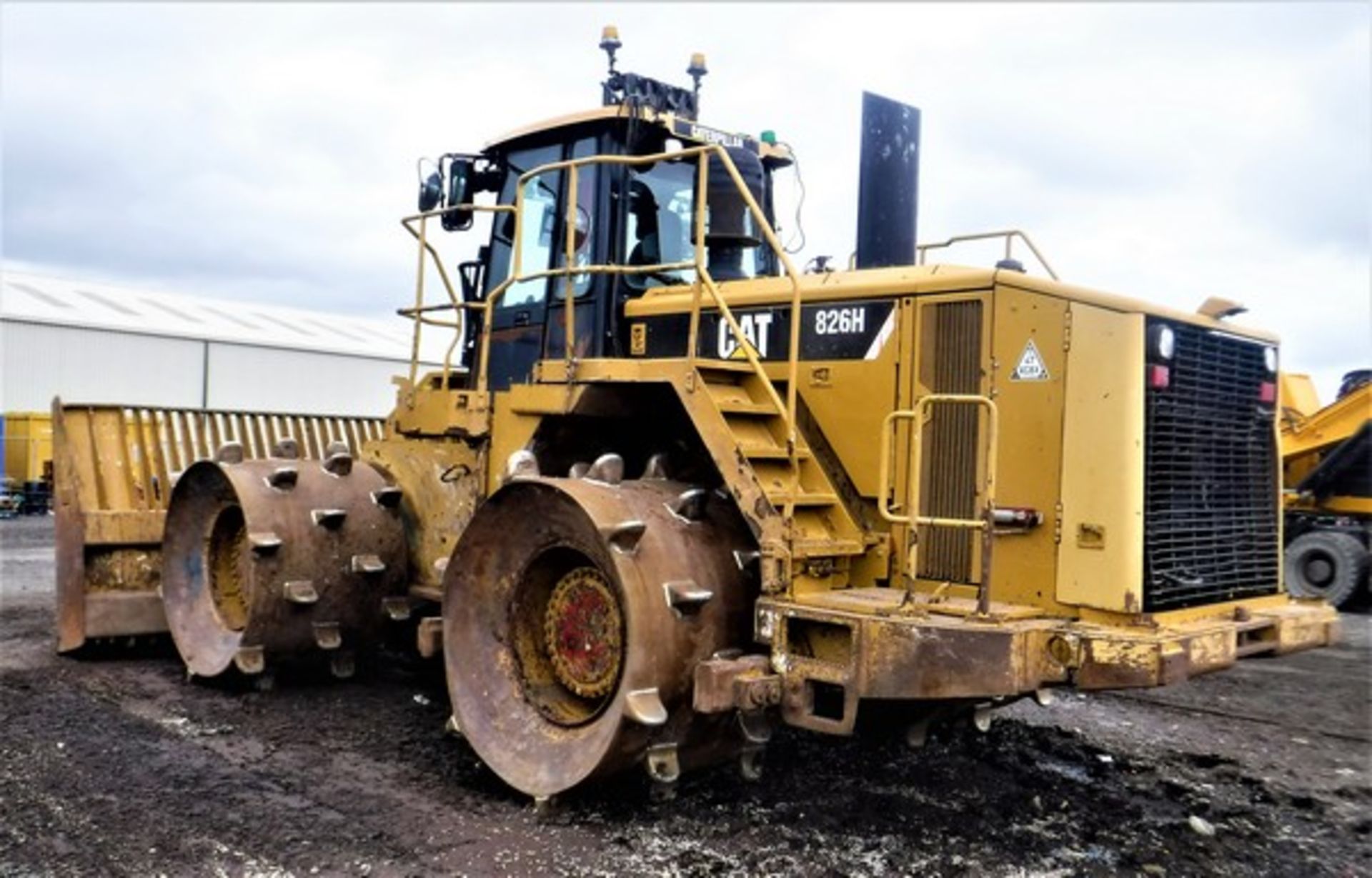 2010 CATERPILLAR 826H landfill compactor c/w service history folder, original invoice and other rele - Image 23 of 24