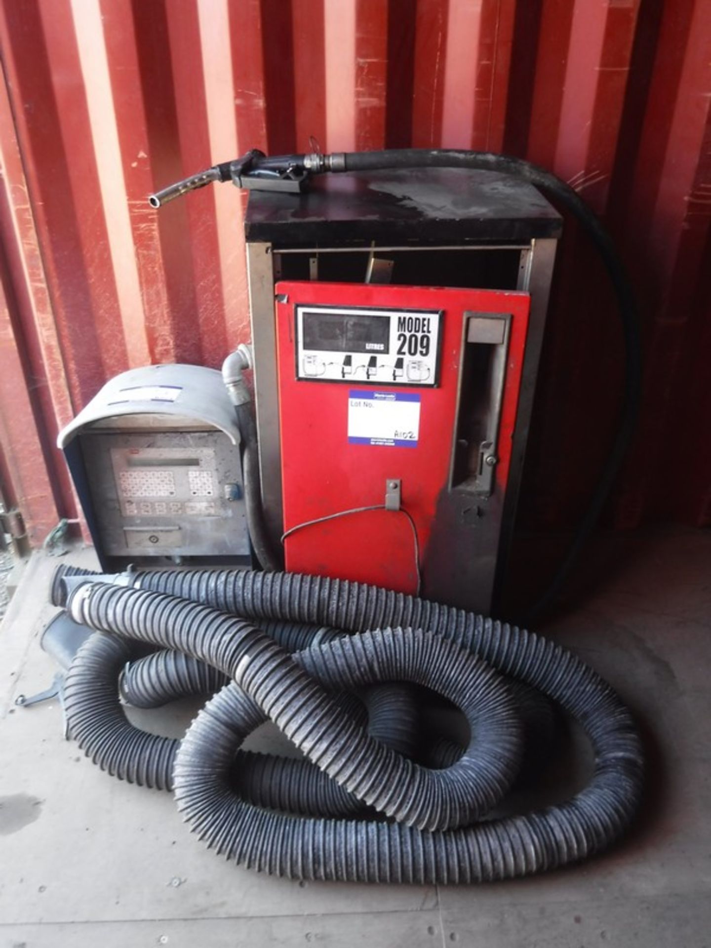 Fuel pump/dispenser spares or repairs with exhaust extractor hoses.
