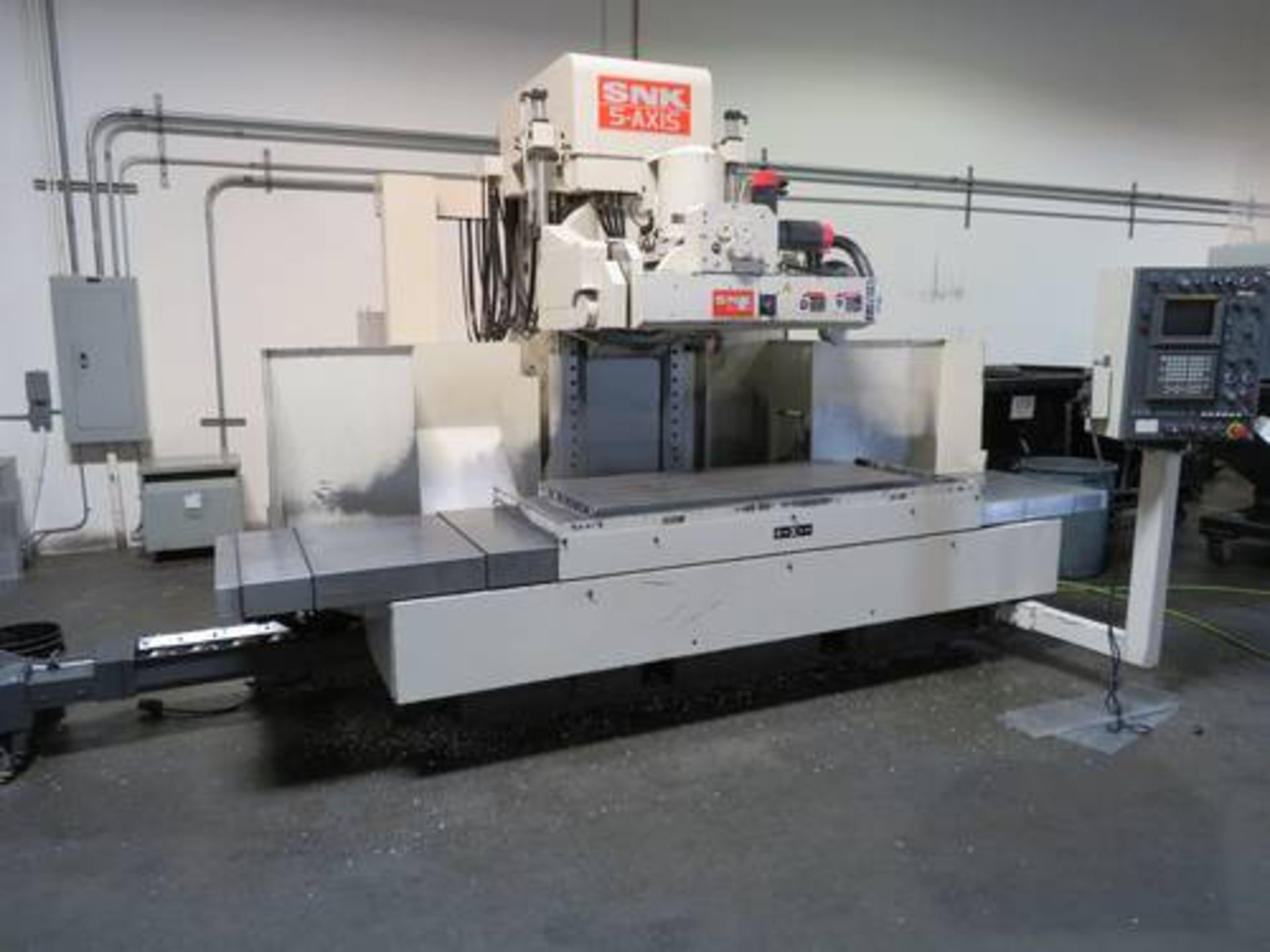 SNK PC60V, 5-Axis V.M.C Fanuc 16IMC Control, 60" x 26" x 18", A&B Axis +/- 25 Degrees, 50 Taper