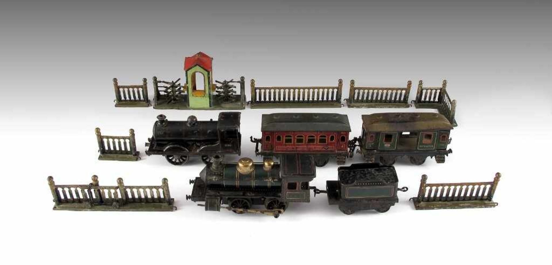 Bing-Eisenbahn-Konvolut Spur 0: zwei Lokomotiven (eine bez. L.L.A., eine bez. 990), Kohlentender,
