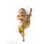 Putto mit Mandoline. Polychrom gefasste Holzfigur. 19. Jh. H 36,5 cm