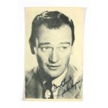 Autogramm von John Wayne auf Portraitkarte