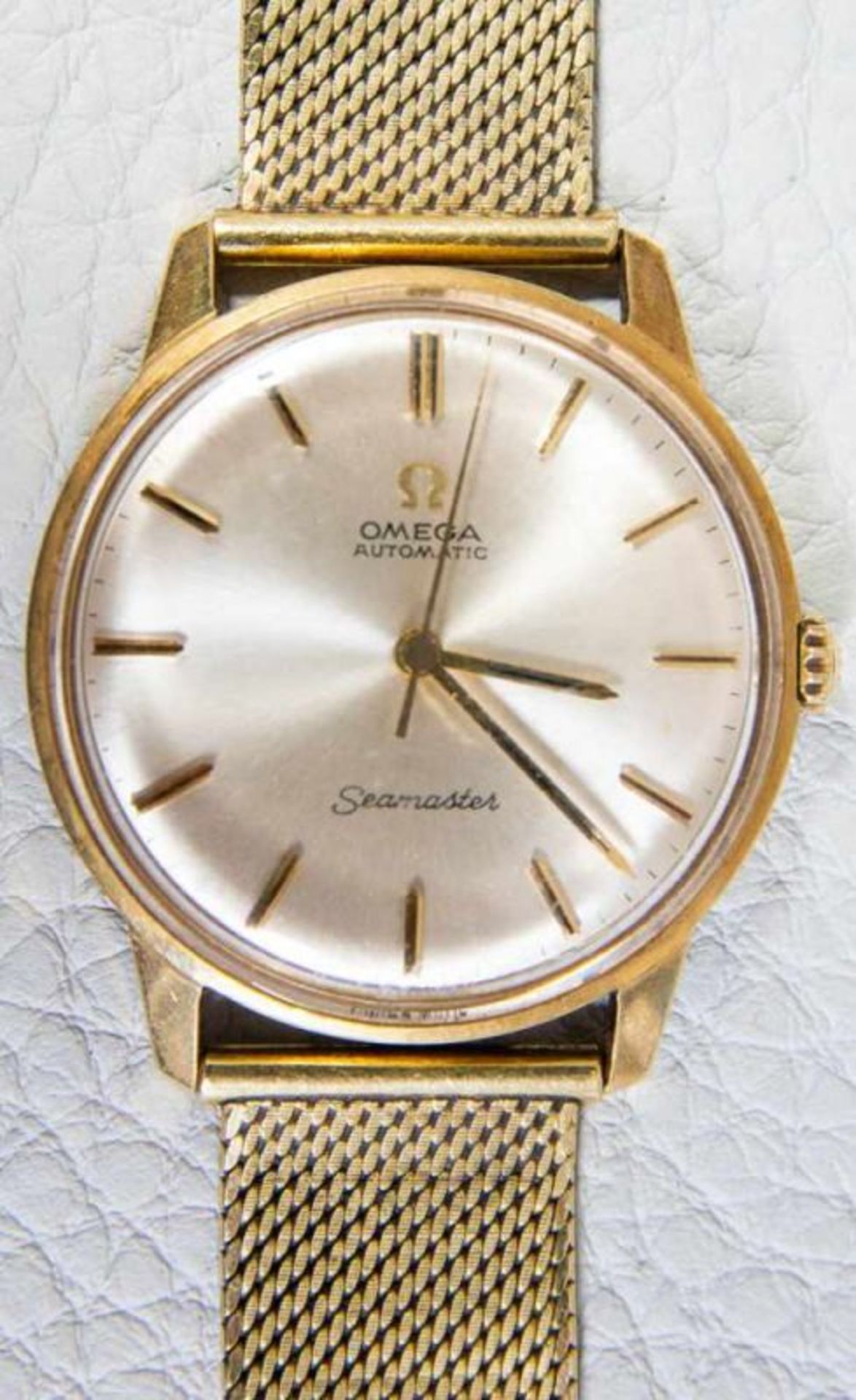 OMEGA SEAMASTER AUTOMATIK Herrenarmbanduhr der 1960er/70er Jahre, Gehäuse und Armband in 585er/14K