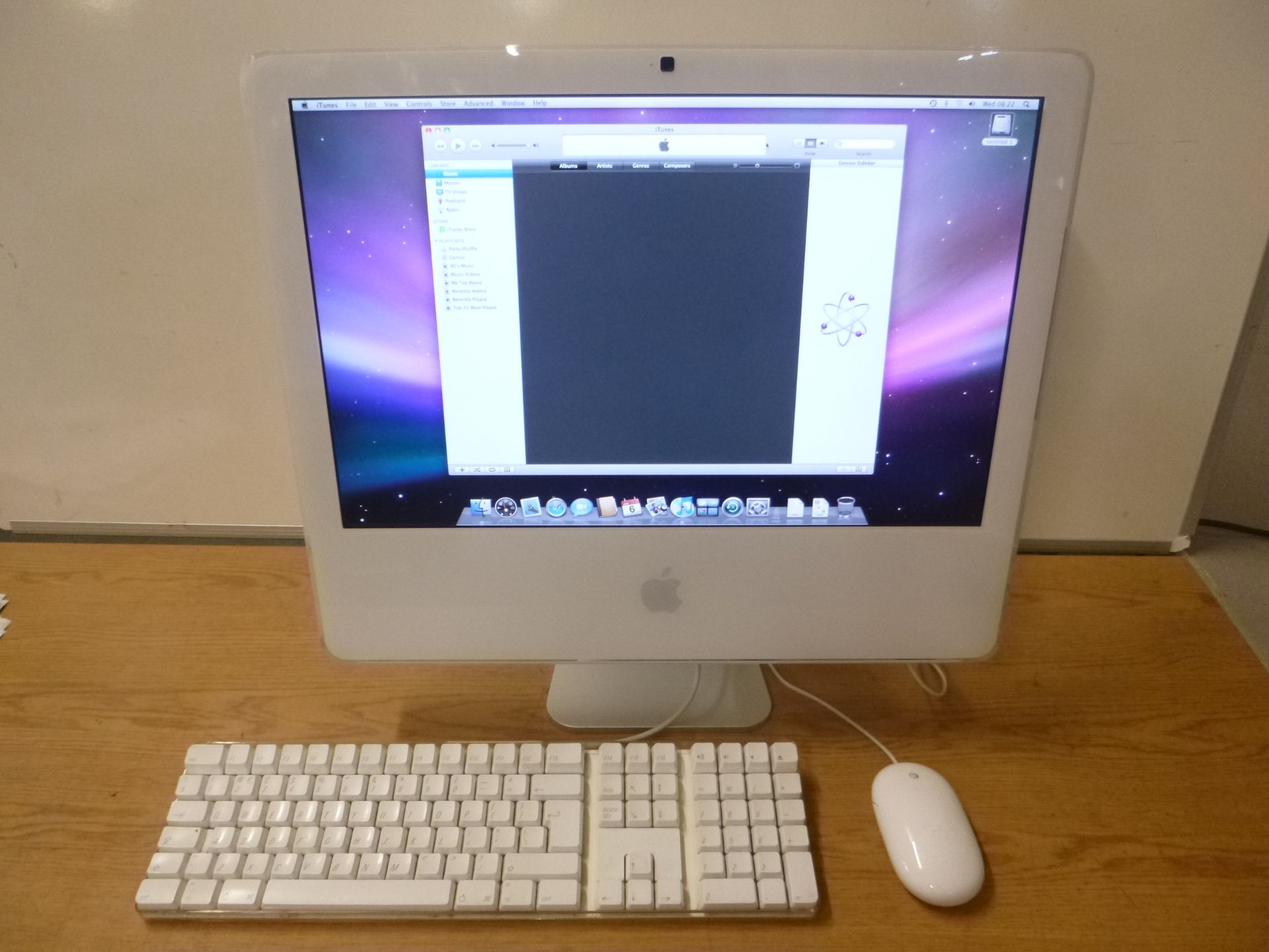 Apple IMac Model A1145. PowerPC G5 20" screen. 2.1 Ghz processor, 2.5GB RAM. 250GB HDD, DVDRW Mac OS