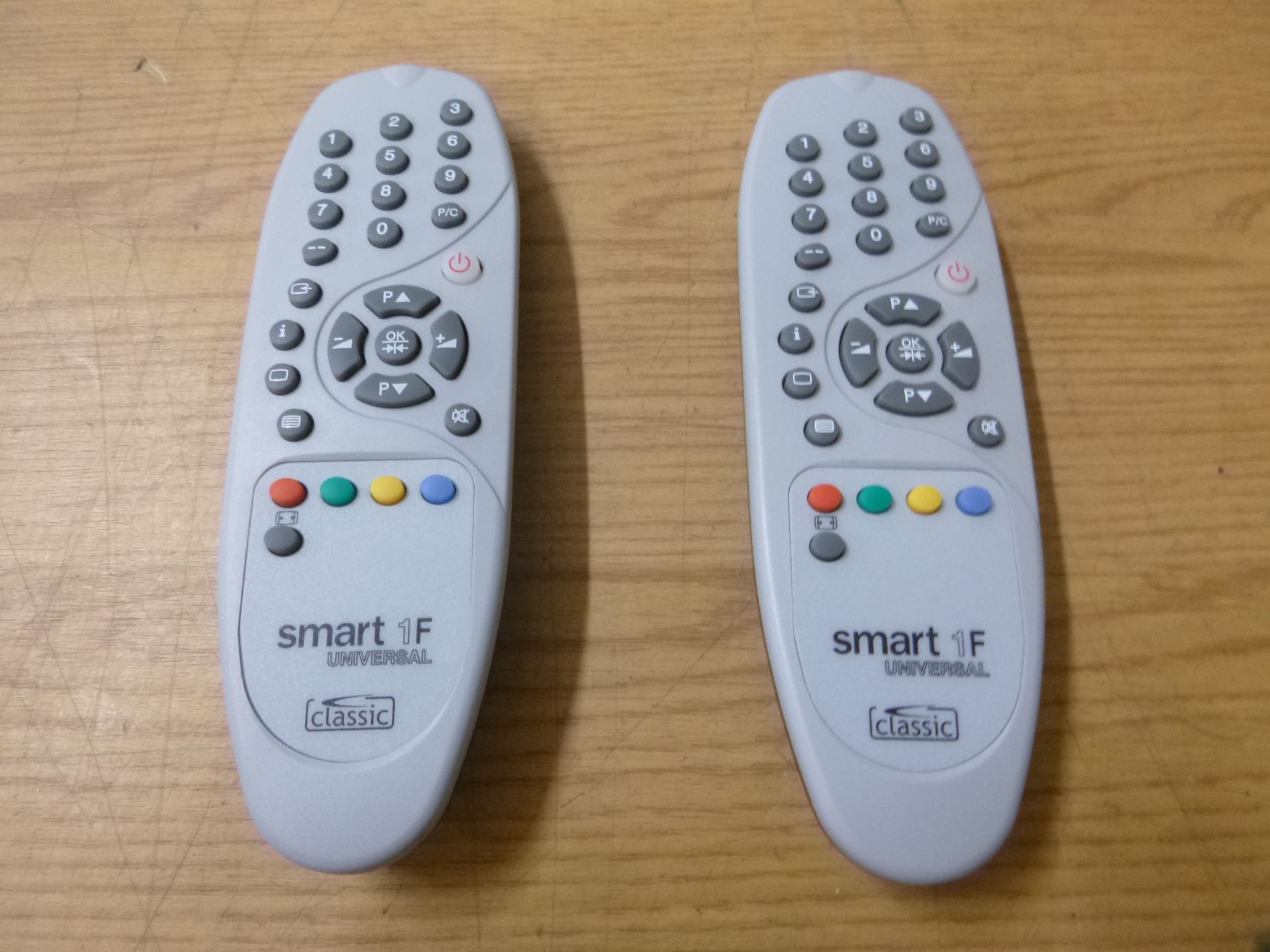 2 X SMART 1F 0942 UNIVERSAL TV REMOTE CONTROLS.