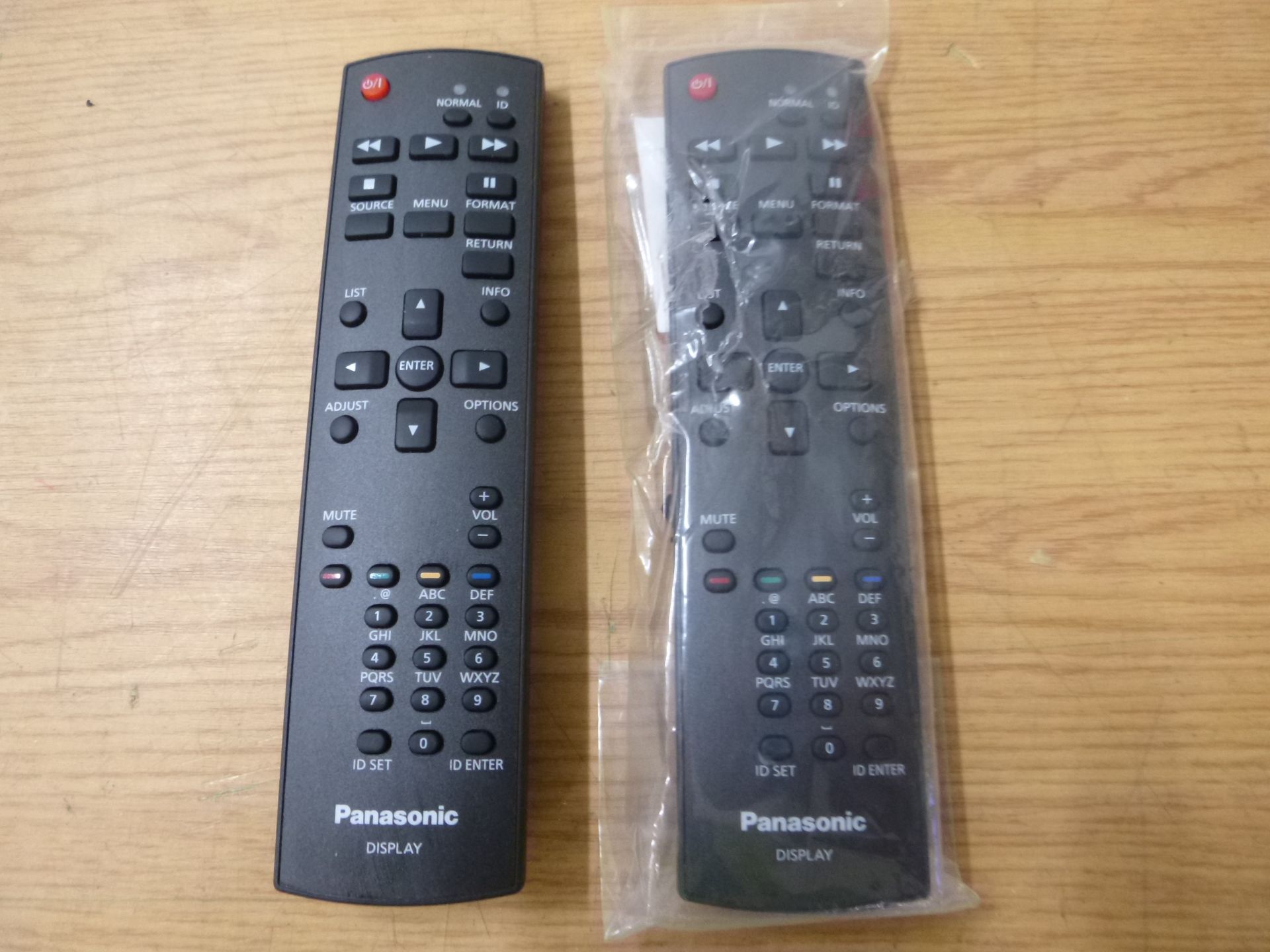 2 X PANASONIC DPVF1663ZA DISPLAY REMOTE CONTROLS.