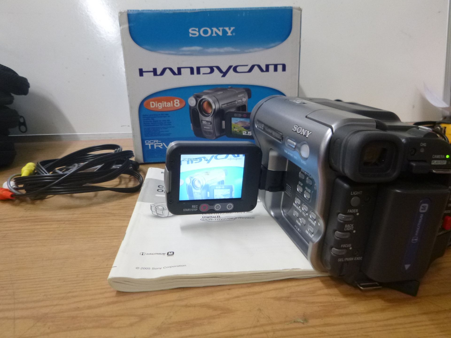 SONY DIGITAL CAMCORDER MODEL DCRTRV270E. BOXED WITH CHARGER, USERS GUIDE, CABLES AND NEW TAPE