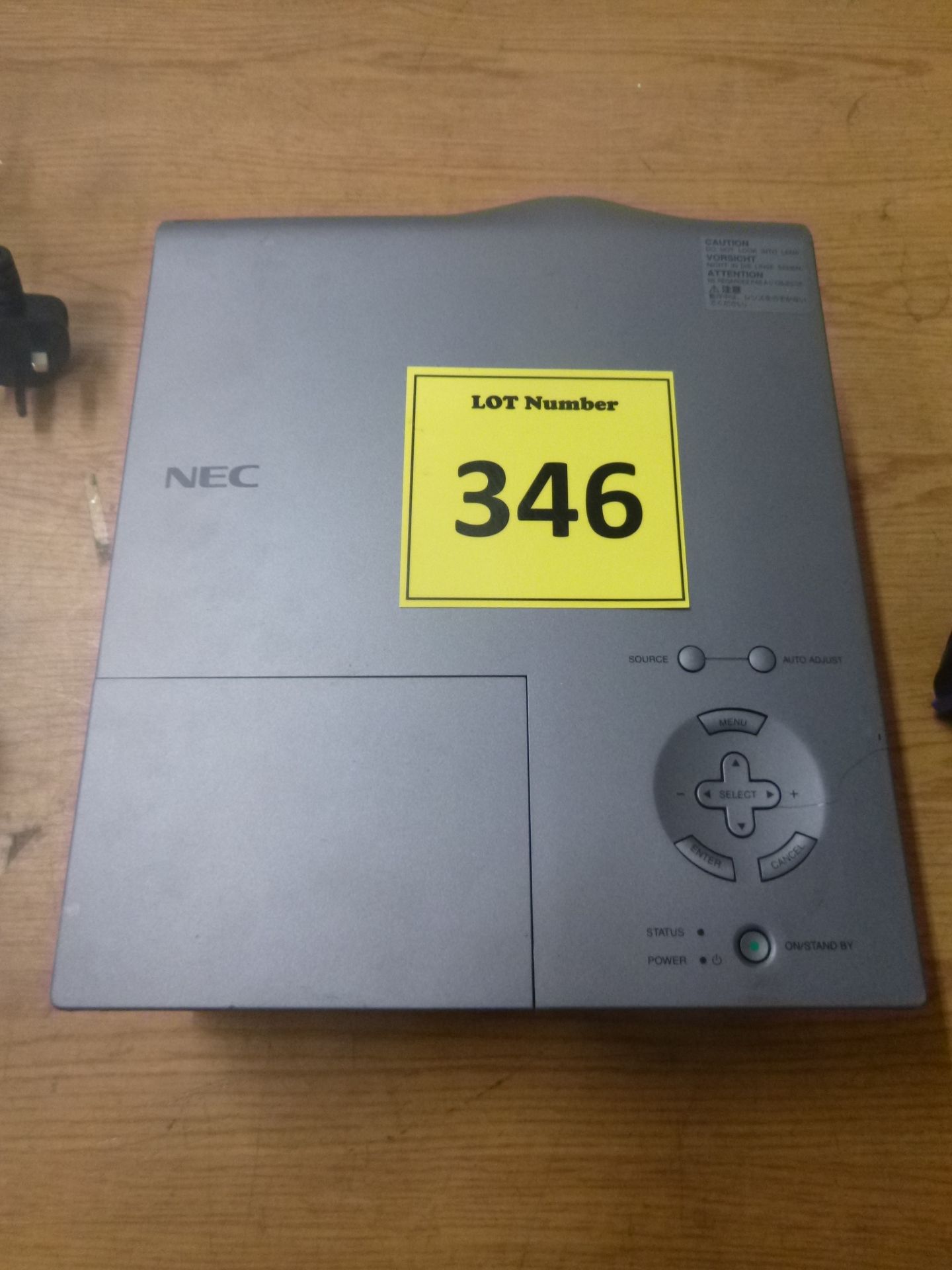 NEC VT650 PROJECTOR. . SHOWING 1198 LAMP HOURS.