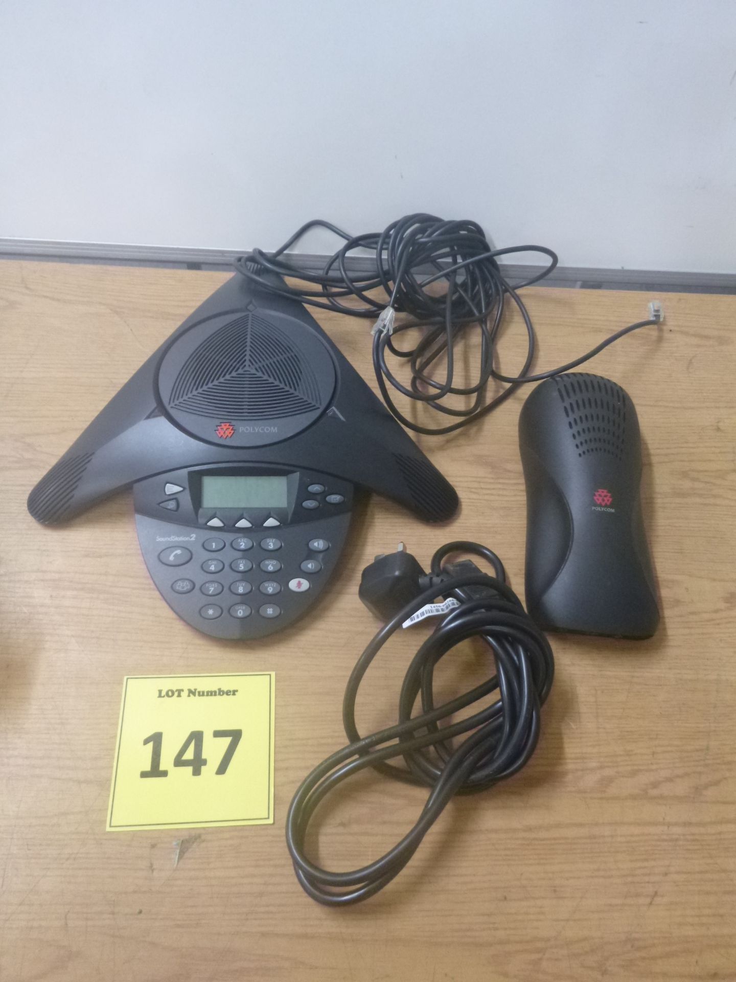 POLYCOM SOUNDSTATION 2 CONFERENCE PHONE WITH SOUNDSTATION 2 UNIVERSAL MODULE AND CABLES.