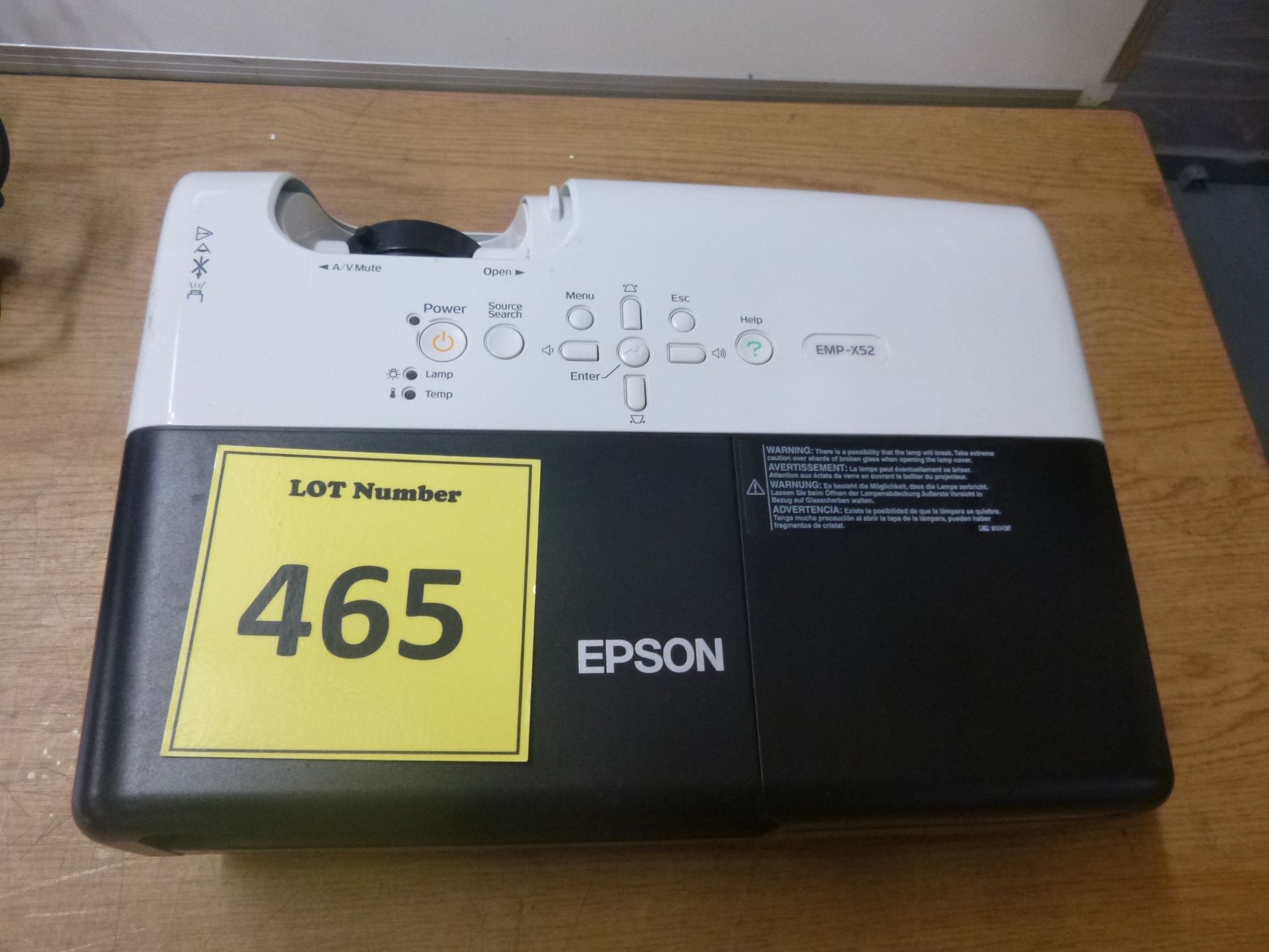 EPSON 3LCD PROJECTOR. MODEL EMP-X52. SEE PHOTO FOR LAMP HOURS.