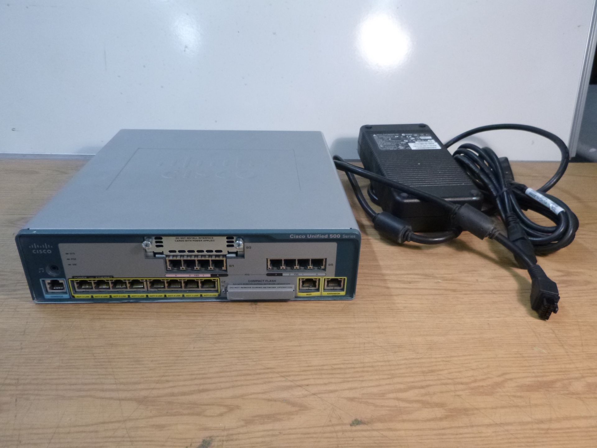 CISCO UNIFIED 500 SERIES ROUTER. MODEL UC520-8U-4FX0-K9 V01. WITH PSU