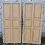 FURNITURE/ HOME - A pair of panelled pitch pine cu