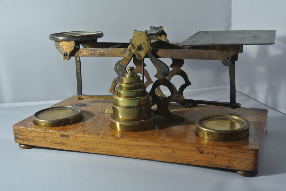 COLLECTABLES - A set of antique brass postal scale