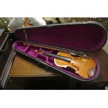 COLLECTABLES - A vintage cased violin with interio